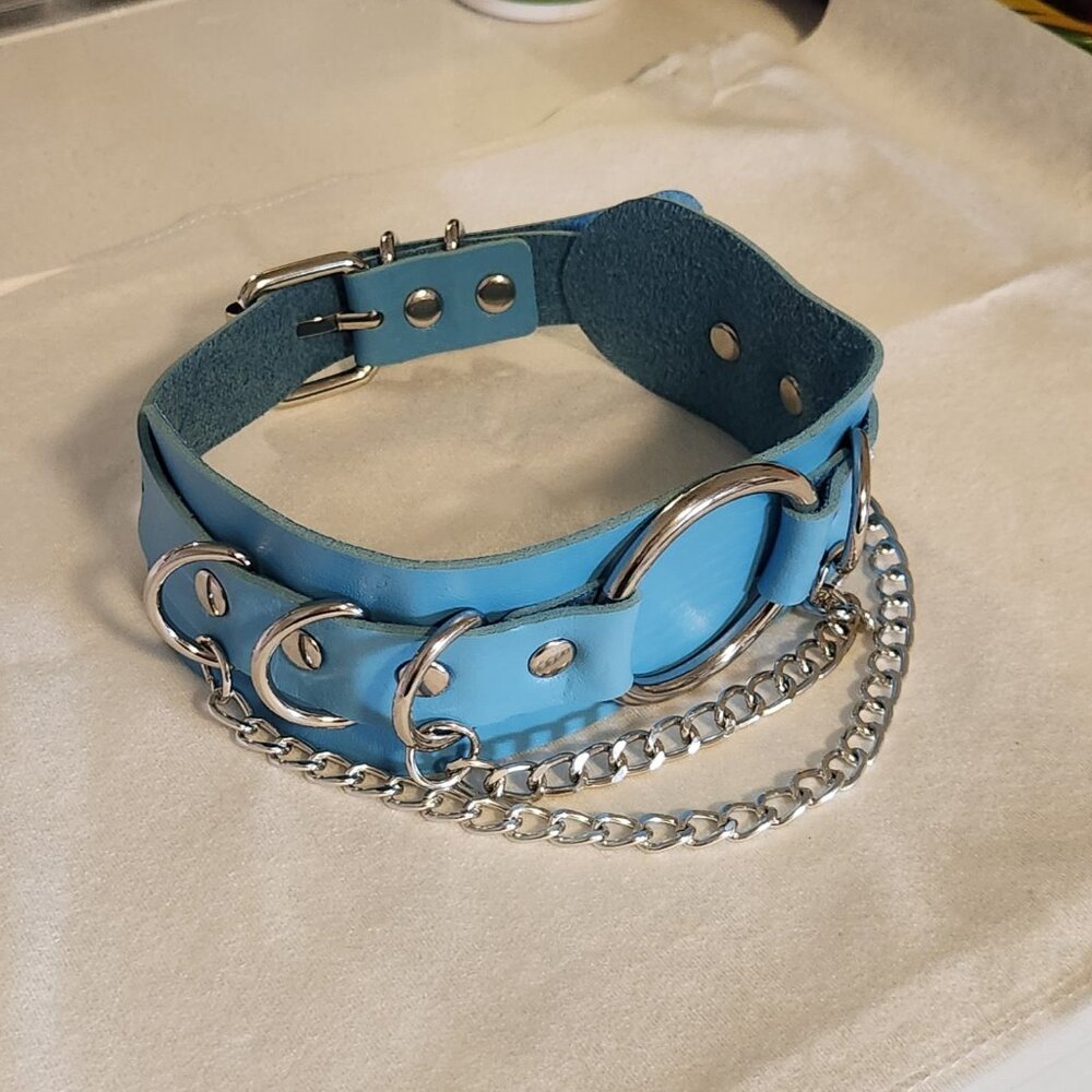 Blue choker necklace fake leather with chains and rings. Fits necks 12" to 17"